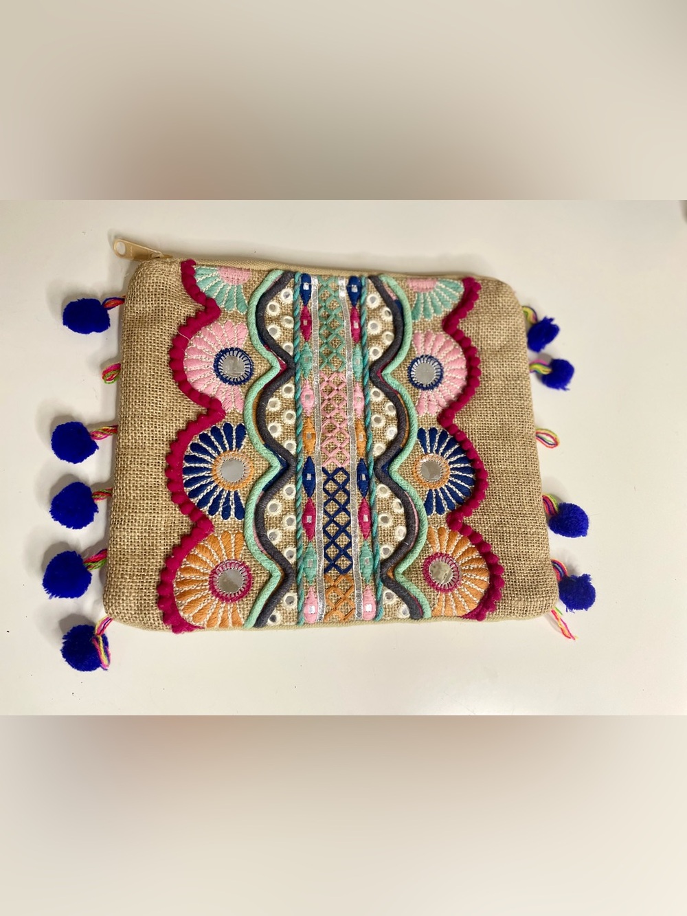 Cost Plus World Market Embroidered Jute Clutch with Blue Pom Tassels
